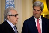 U.N-Arab League envoy for Syria Lakhdar Brahimi, left, speaks next to U.S. Secretary of State John Kerry, after their meeting at Winfield House, the residence of the U.S. Ambassador to Britain, in London, Monday, Oct. 14, 2013. Kerry and Brahimi said Monday that an international conference to set up a Syrian transitional government must be organized urgently and held as soon as possible. (AP Photo/Jacquelyn Martin, Pool)