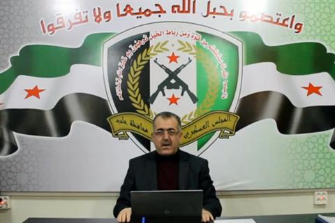 This YouTube grab shows Col. Abdel-Jabbar Ukaidi, as he announces his resignation Sunday, Nov. 3, 2013. (The Daily Star/YouTube grab)  Read more: http://dailystar.com.lb/News/Middle-East/2013/Nov-03/236696-top-syrian-rebel-commander-announces-resignation.ashx#ixzz2jiwKcGtm (The Daily Star :: Lebanon News :: http://www.dailystar.com.lb)