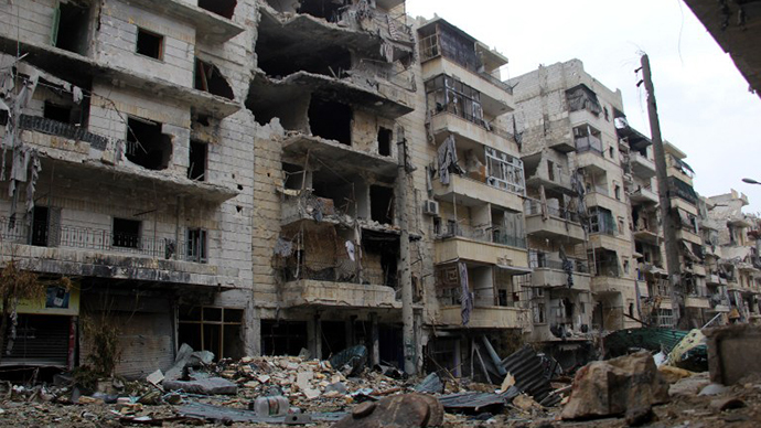 A destroyed street is seen in the Salaheddin neighbourhood of the northern Syrian city of Aleppo as clashes continue between forces loyal to Syria's President Bashar al-Assad and opposition fighters on January 27, 2014. (AFP Photo / Shahba Press)