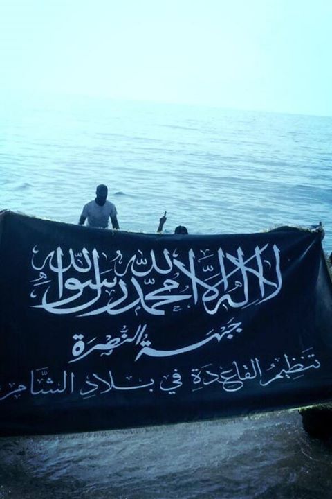 Dr. Joshua Landis, internationally recognized Syria expert and founder of Syria Comment, linked to this photo on his Twitter account today (3/29). Landis commented: “Al-Qaida’s flag now flies on the Mediterranean Sea” -presumably in acknowledgement of the historic precedent this sets.