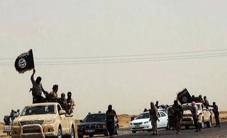 An image uploaded on June 14, 2014 on a jihadi website allegedly shows militants of the Islamic State of Iraq and Syria driving on a street in the Salaheddin province. (Photo: AFP / Wilayat Salaheddin)